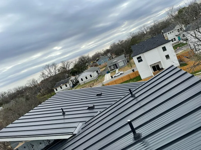 Standing seam metal roof panels with vents for Skylight Repair in Princeton